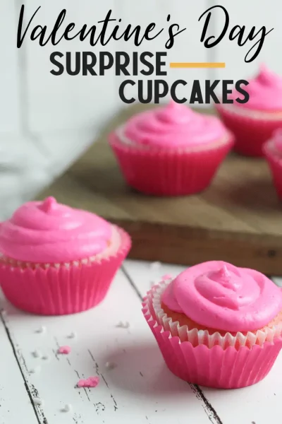Sprinkle Filled Cupcakes with Strawberry Buttercream Frosting