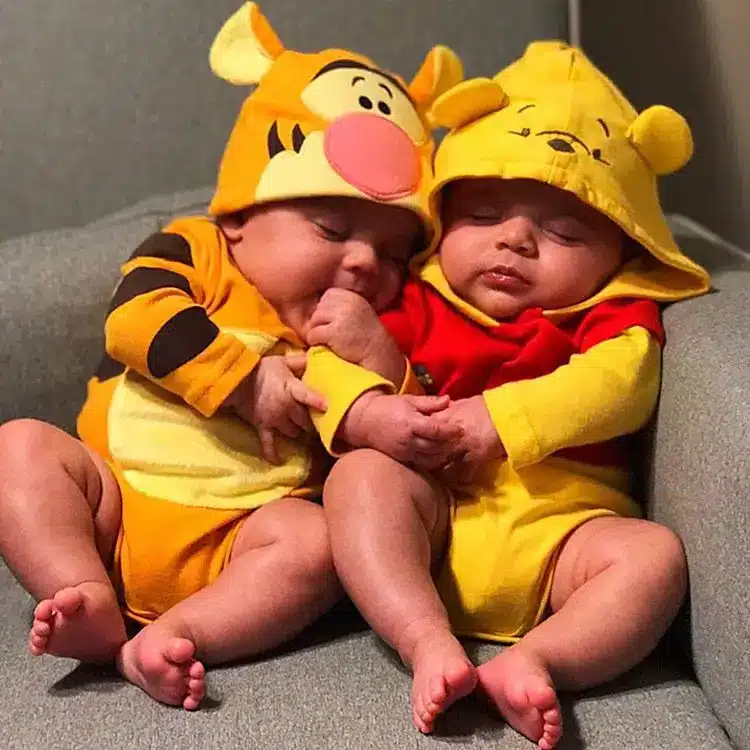 Dress up your twins as Winnie The Pooh and Tigger for Halloween this year.