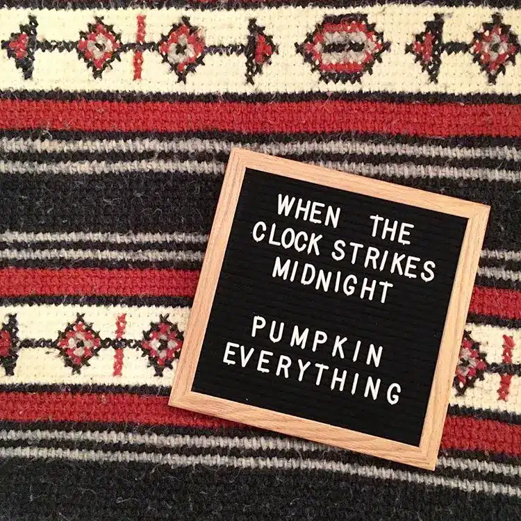 Letter board that says "When the Clock Strikes Midnight pumpkin everything"