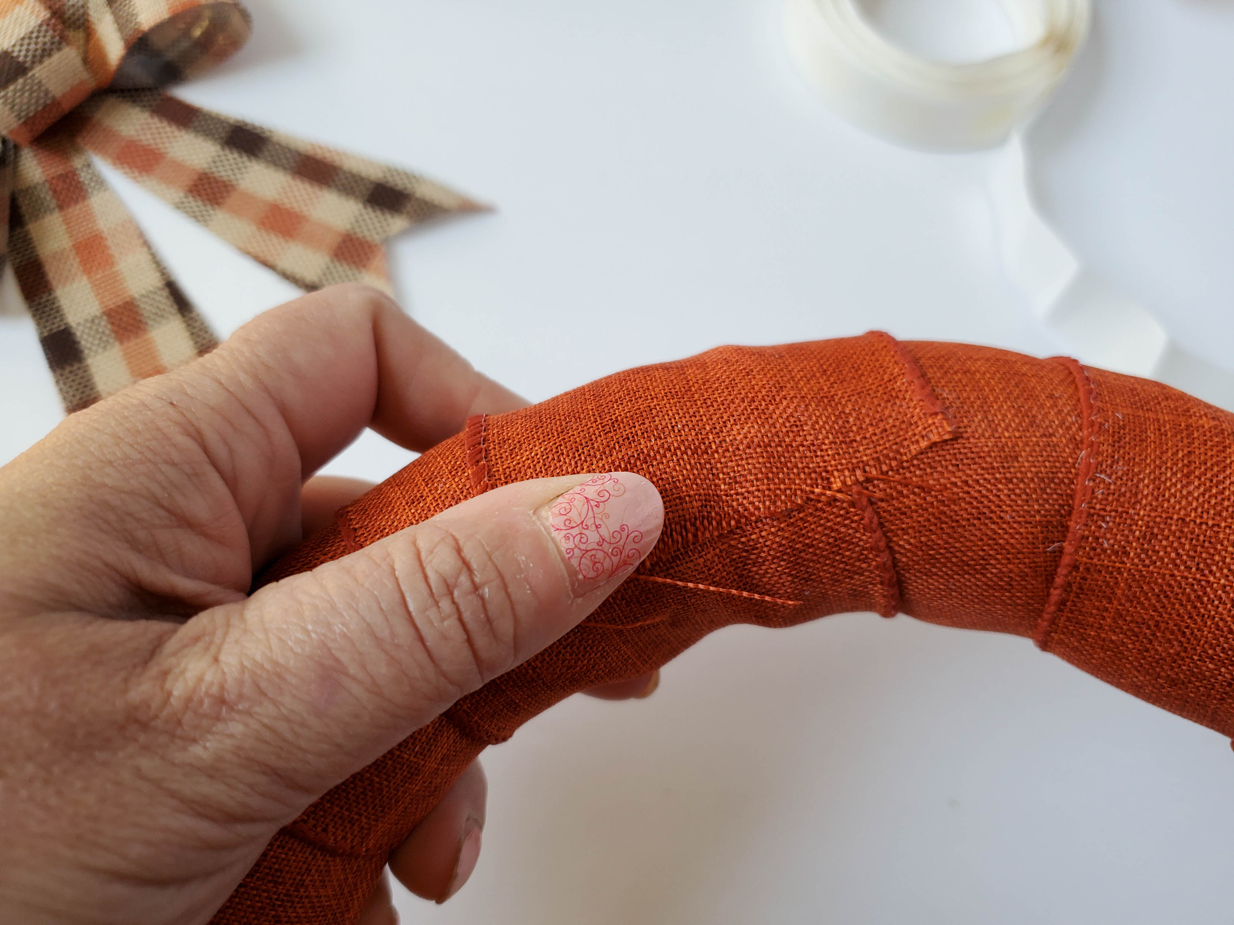 Dollar Tree orange plaid wreath