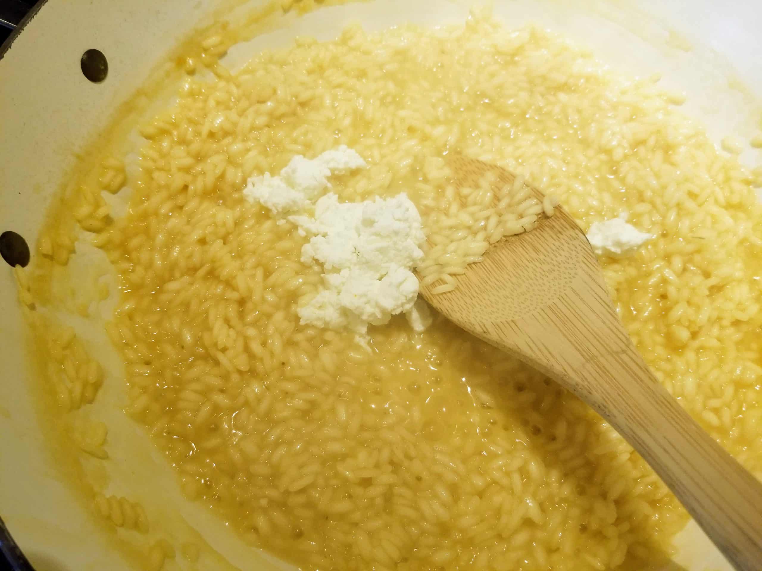 add goat's milk cheese to scallop risotto
