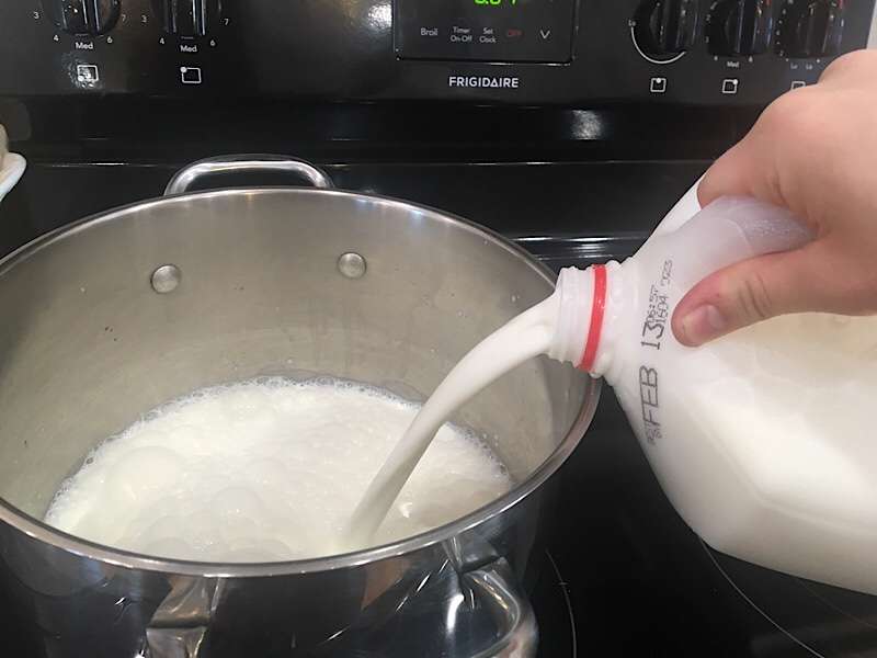 pour milk in pot