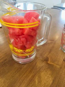 Glass Pitcher with watermelon chunks inside