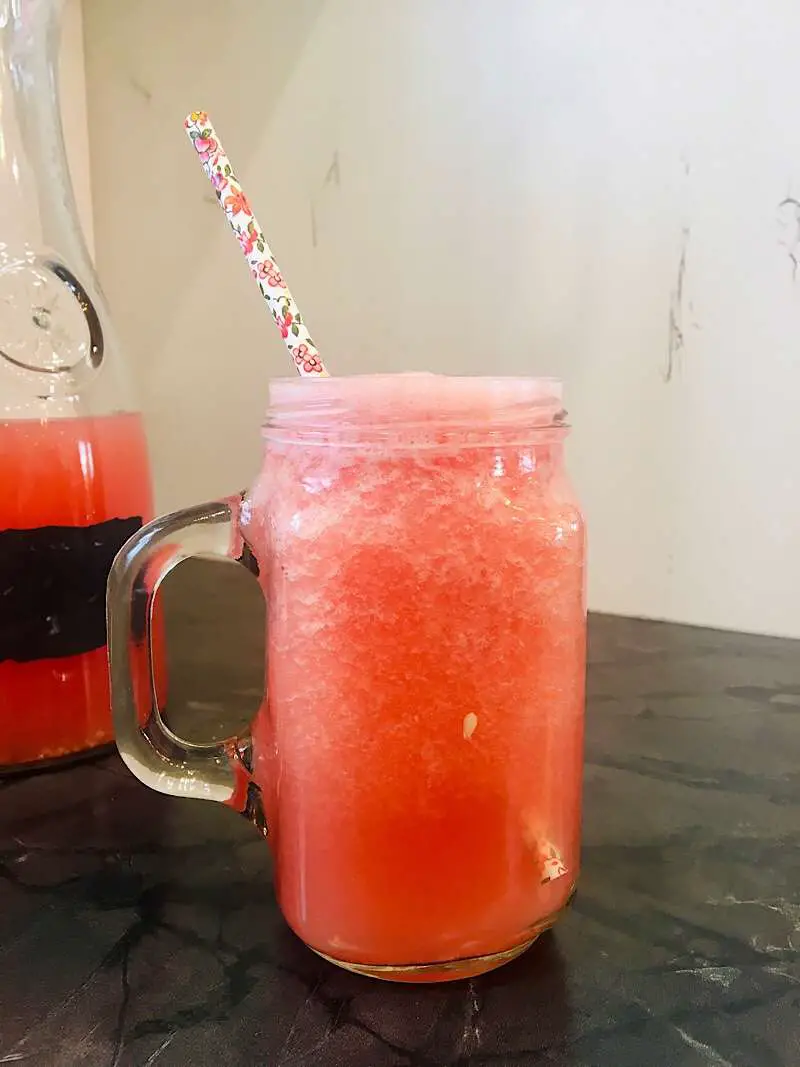 glass cup with pink straw 