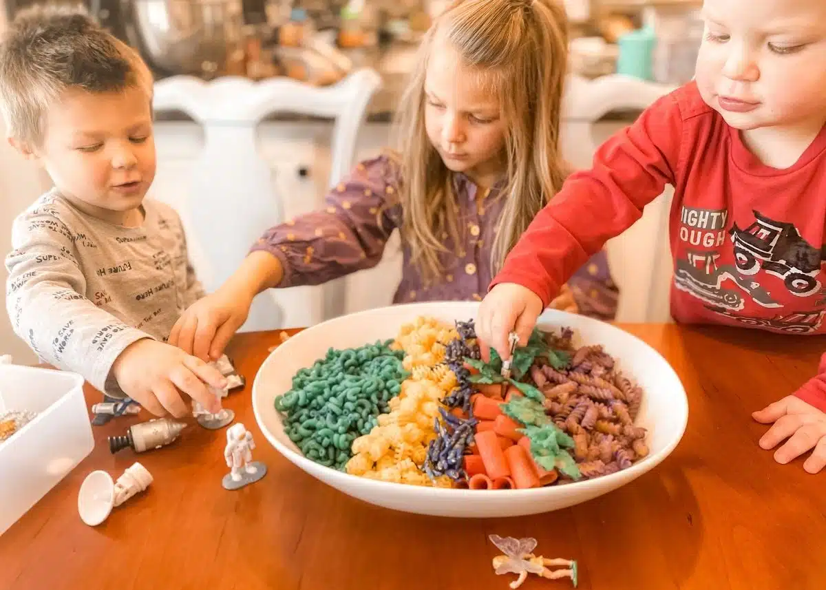 My three kids playing with the pasta and astronauts and fairies.