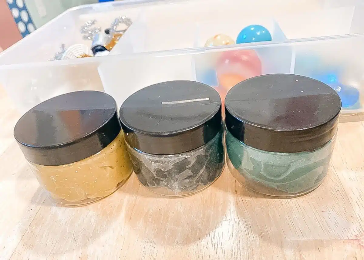 Glittery gold, black, and green playdough