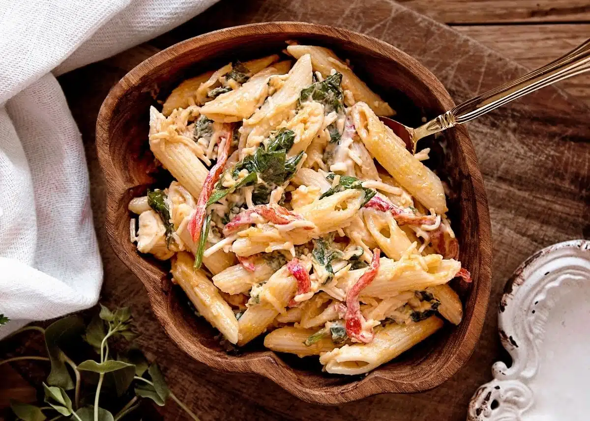 Penne pasta with sun dried tomatoes and spinach.