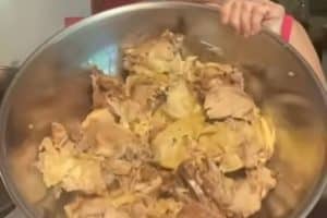 Add heavy cream and shredded chicken