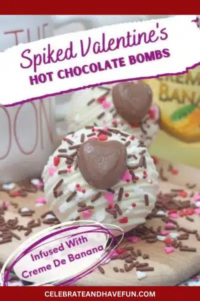 Valentine's Day Hot Chocolate bomb next to a mug and bottle of liquor