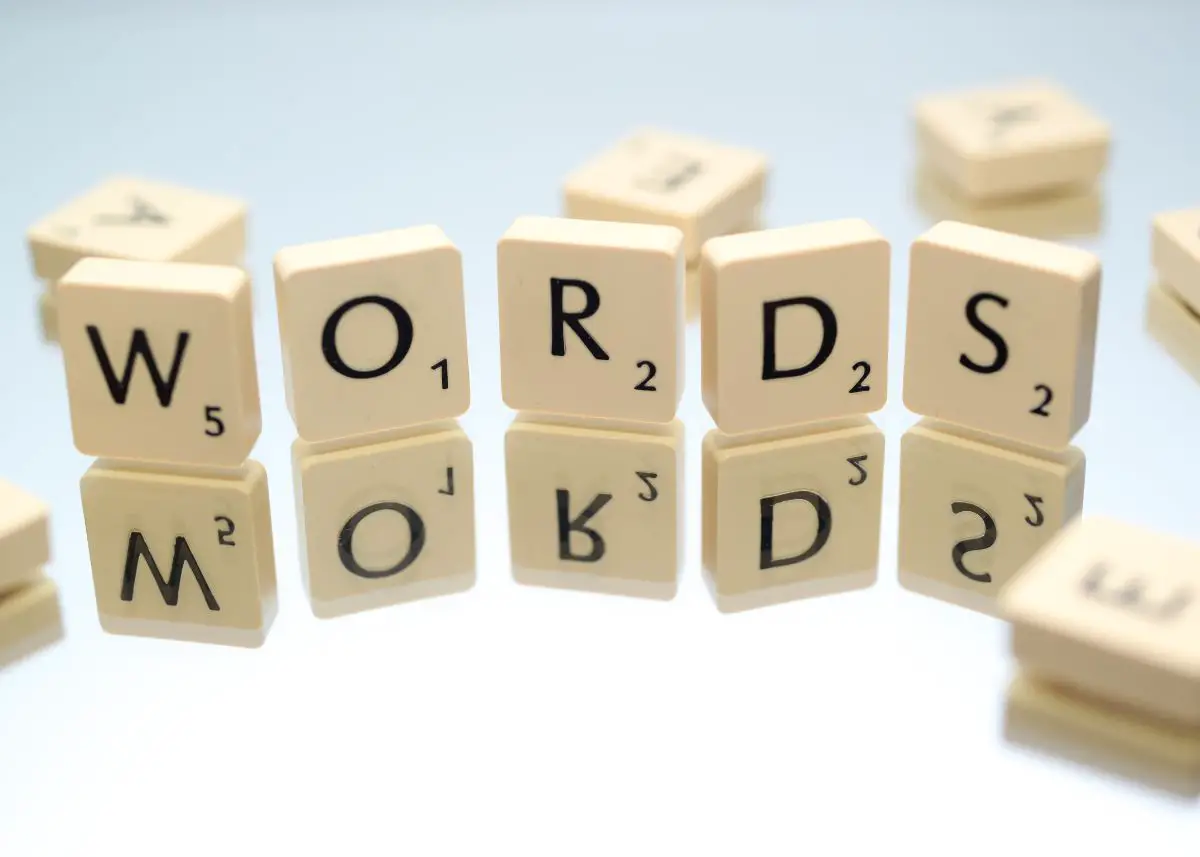 This is a closeup picture of Scrabble letters that spell the word "Words".