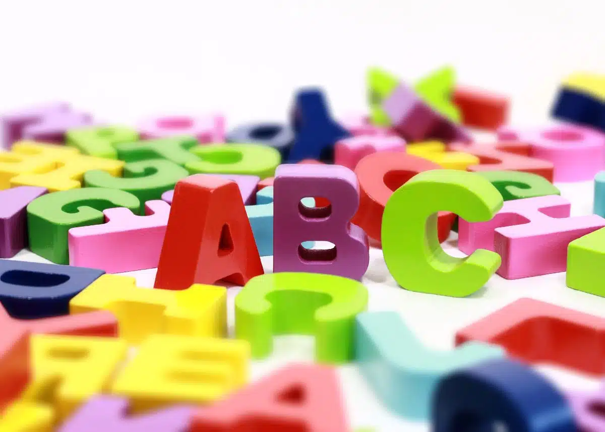 Wooden colorful alphabet letters.