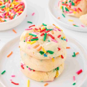 Funfetti cake mix cookies in a stack on a plate