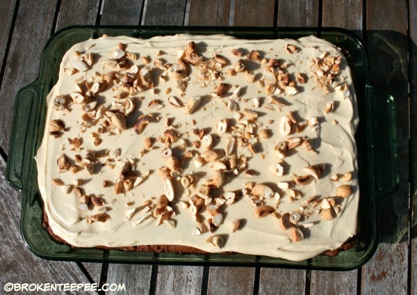 frost cake and sprinkle with chopped nuts