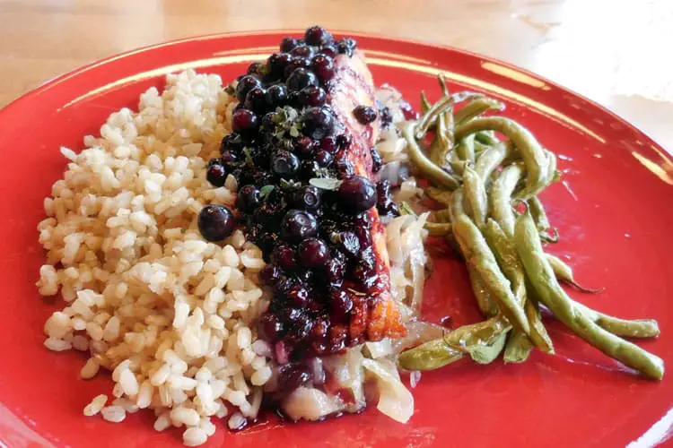 Salmon Recipes: Salmon with Huckleberry Sauce on Caramelized Onions