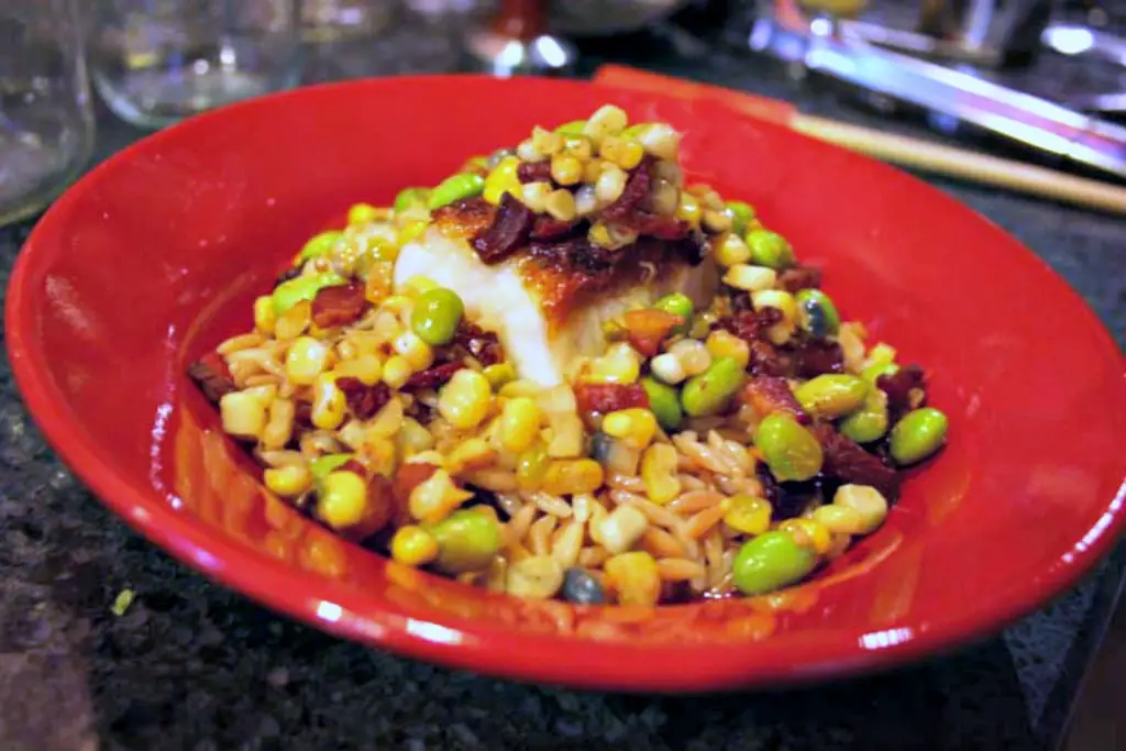 Chilean Sea Bass Recipe: on Toasted Orzo with Raisins with Edamame, Corn and Bacon